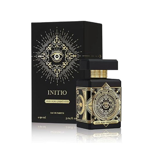 Oud for Greatness Eau de Parfum bottle with packaging